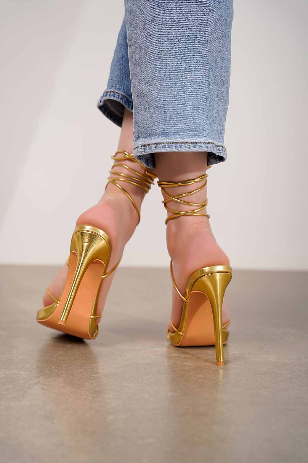 Gold strappy shop heels near me