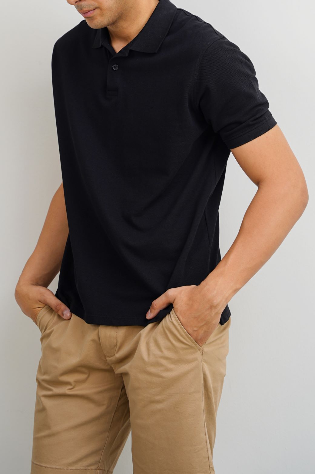 BLACK KNITTED POLO