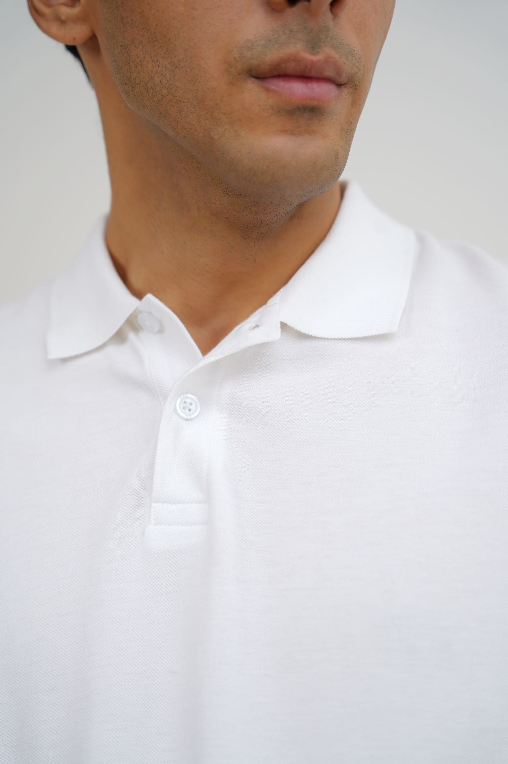 WHITE KNITTED POLO