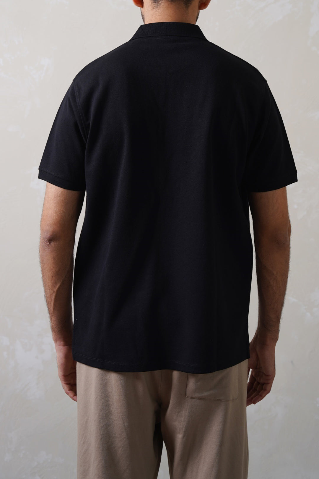 BLACK QUARTER ZIP POLO