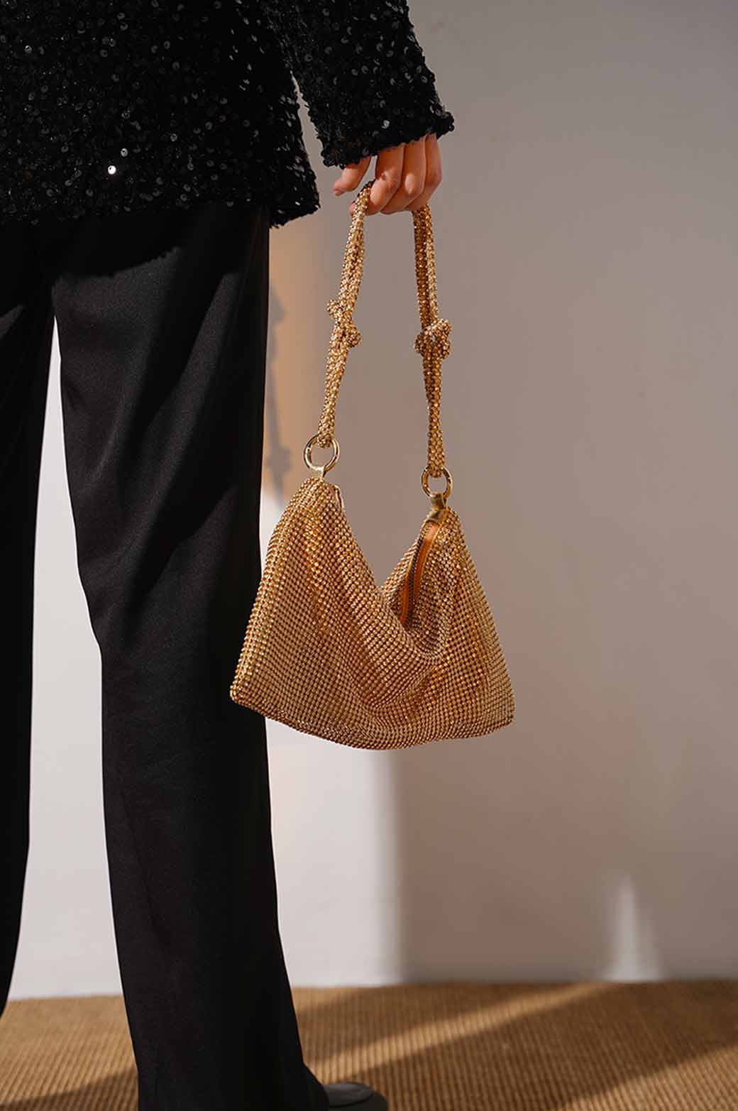 Gold woven outlet bag