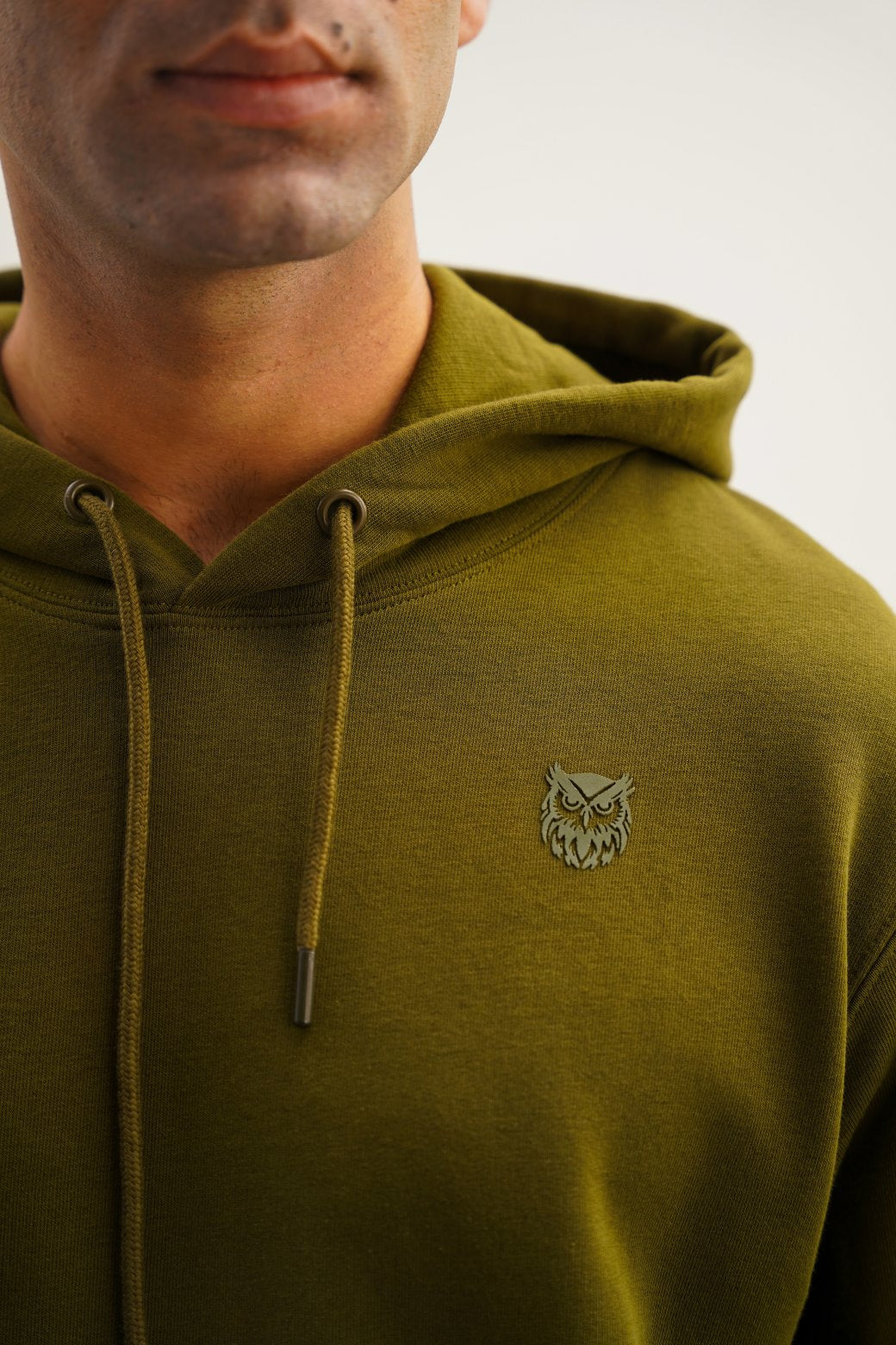 OLIVE EMBLEM PRINTED HOODIE