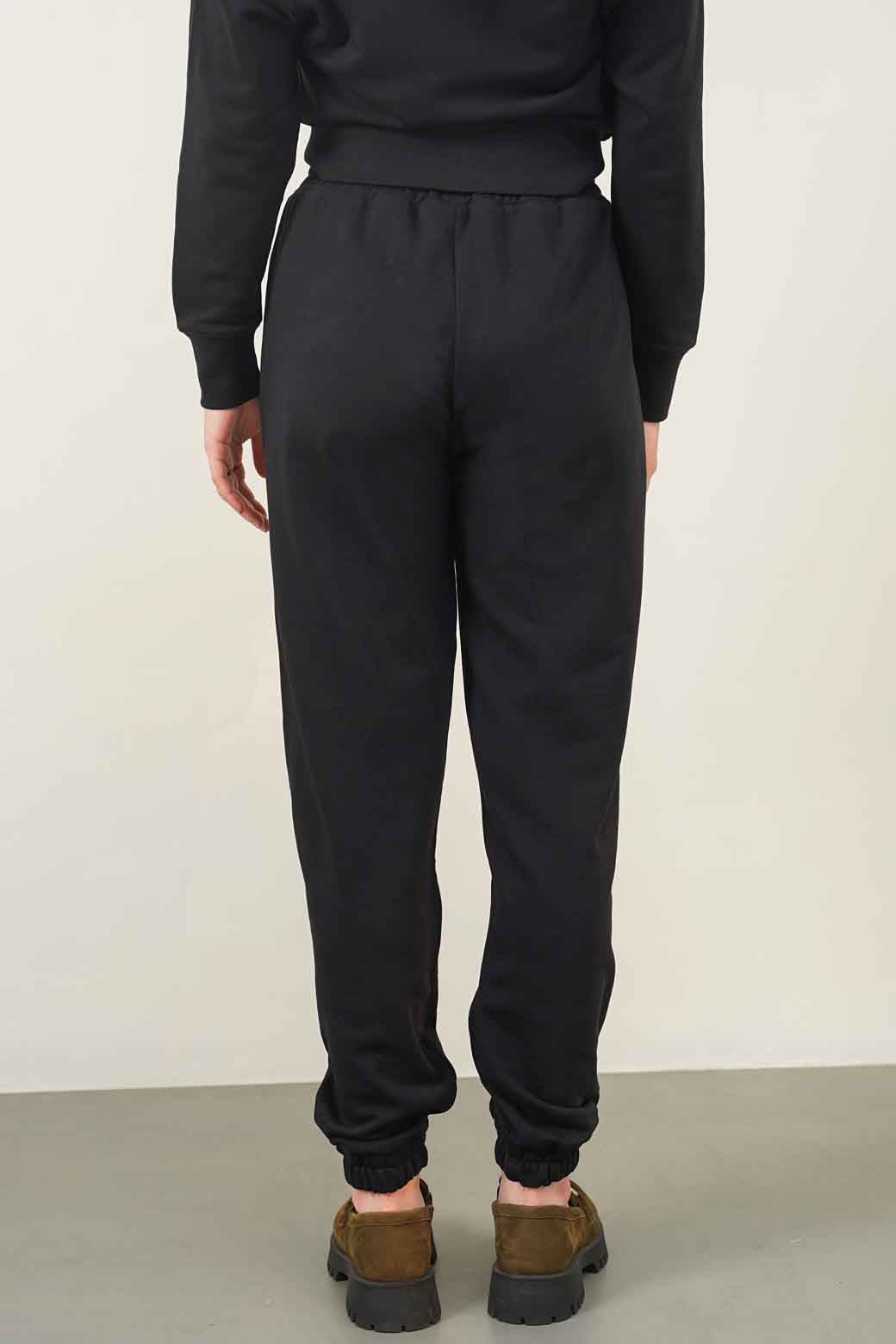 BLACK TROUSER WITH ELASTICATED HEM