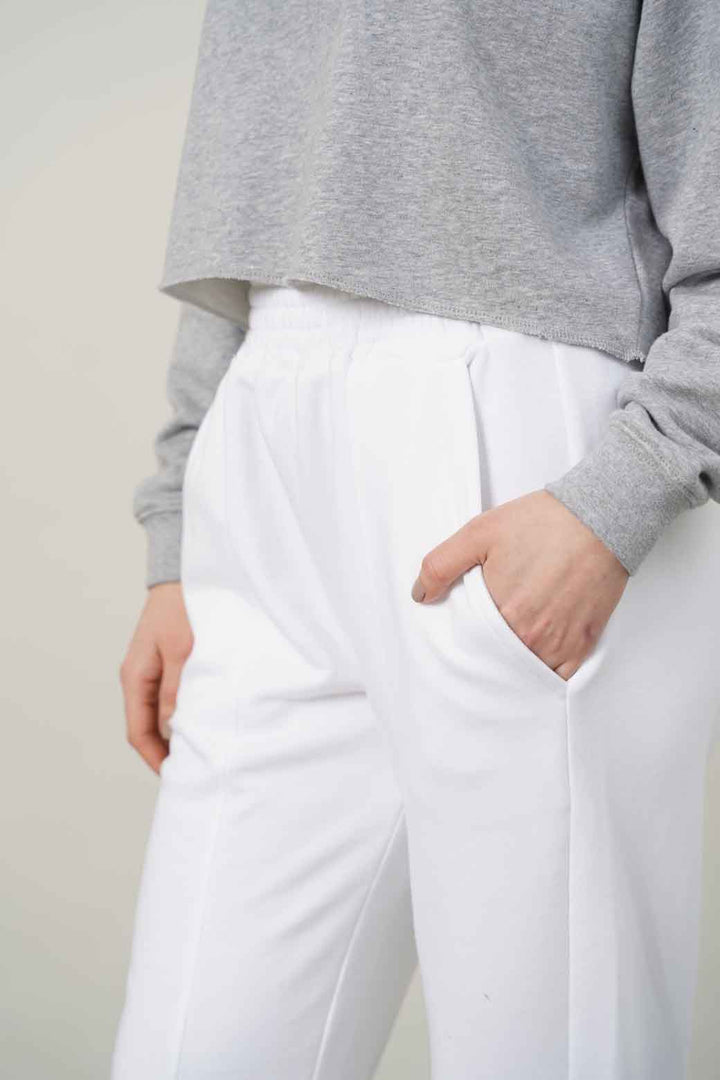WHITE TROUSER WITH ELASTICATED HEM