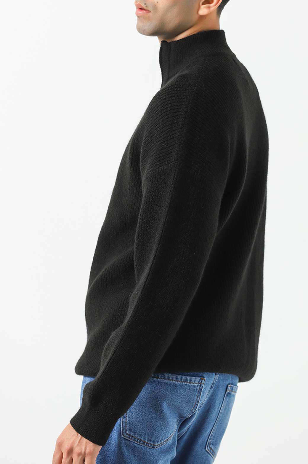 BLACK RELAXED MOCK NECK SWEATER.