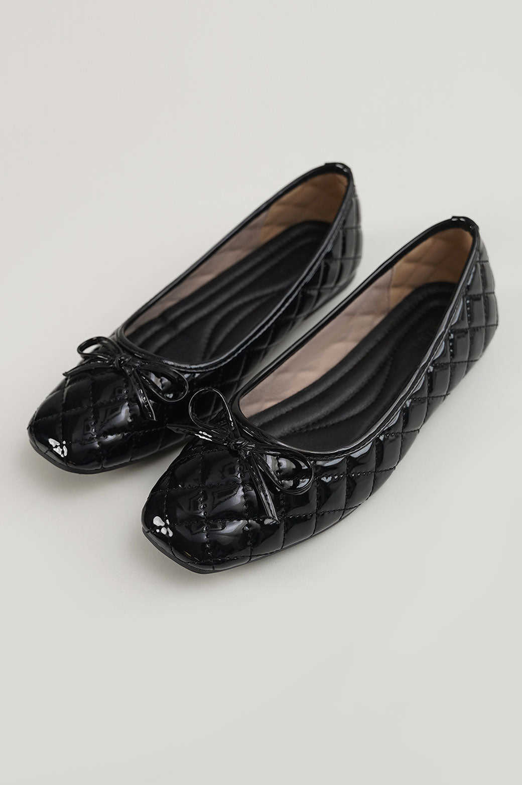 BLACK QUILTED BALLET PUMPS