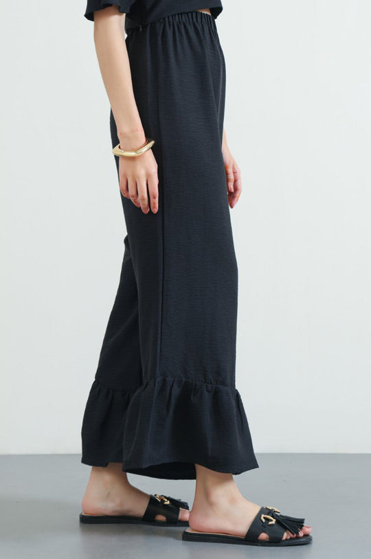BLACK RESORT FLARED PANTS