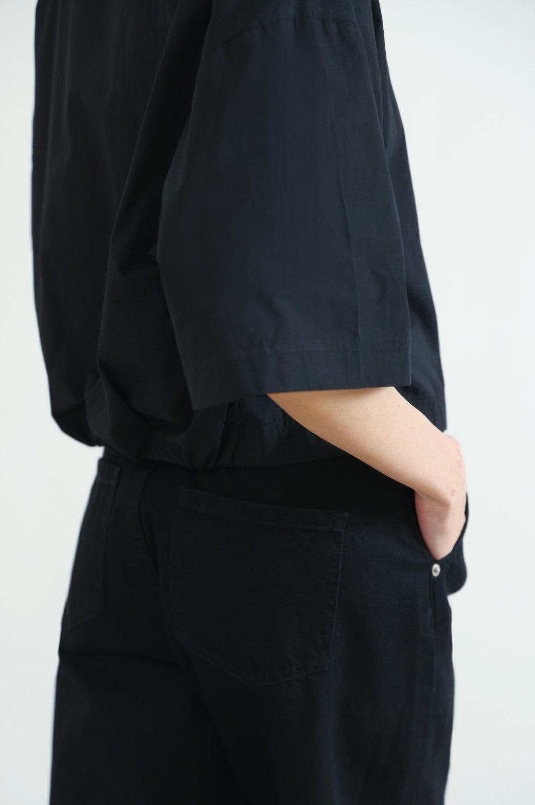 BLACK SHORT SHIRT WITH STRETCHY BACK