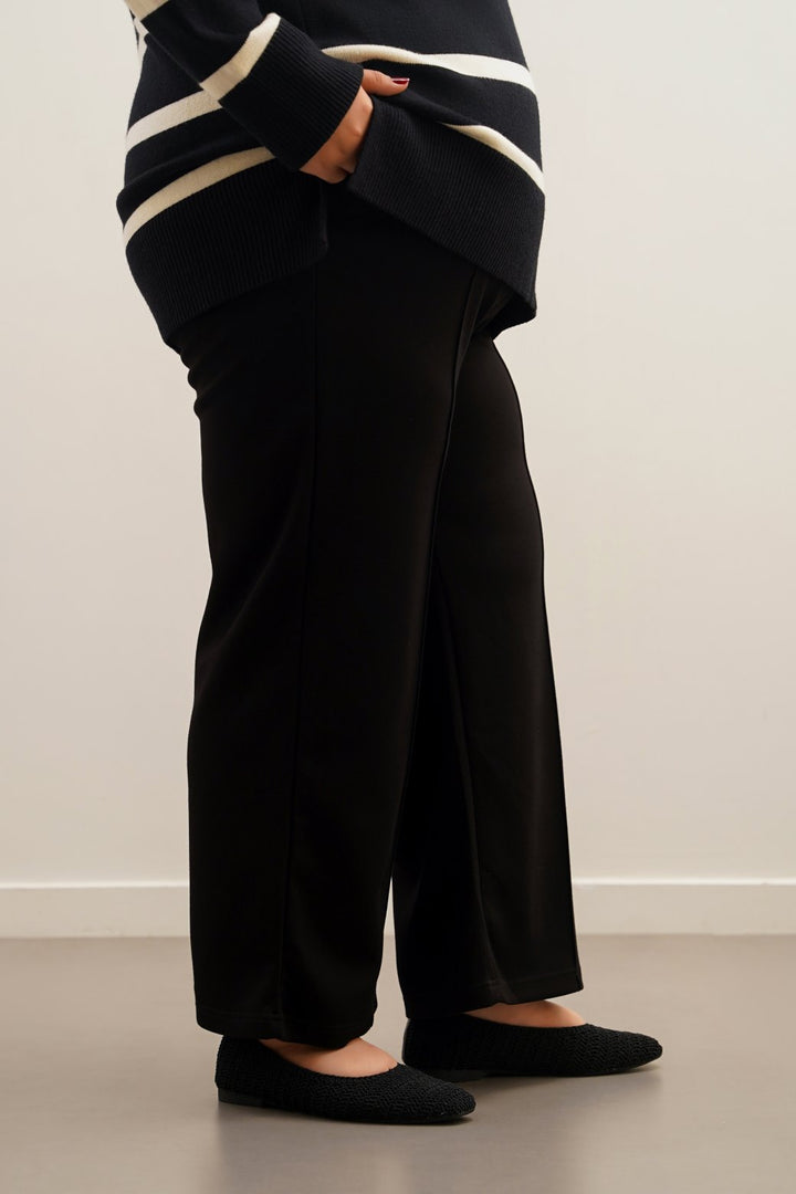 BLACK CURVE PLEATED TROUSERS