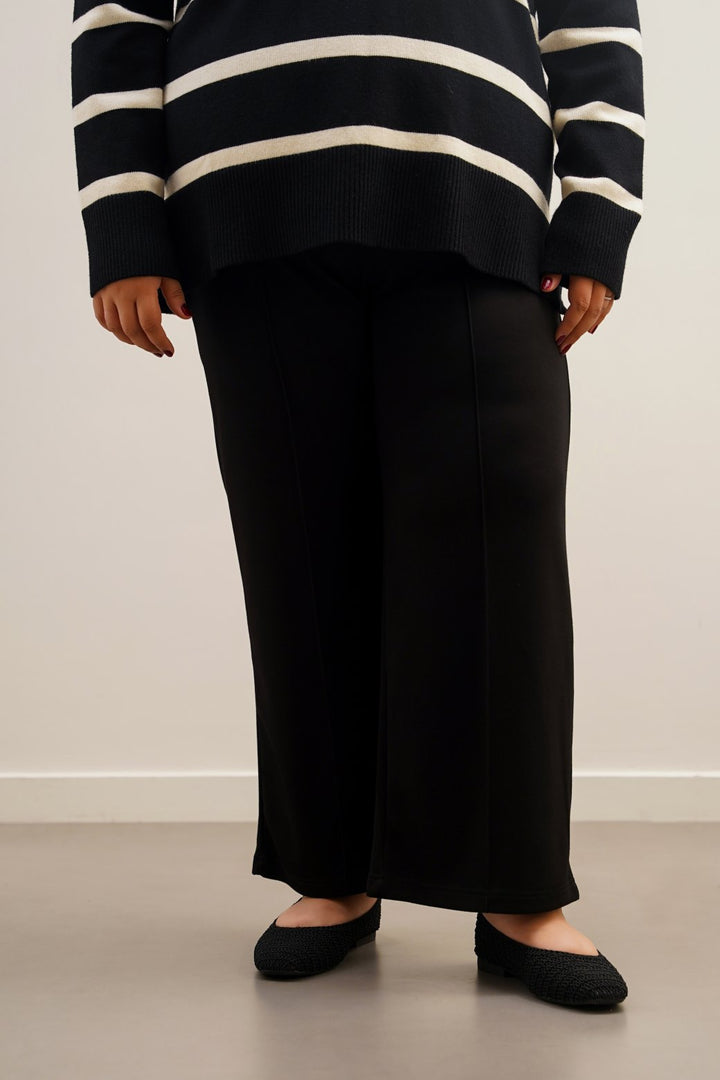 BLACK CURVE PLEATED TROUSERS