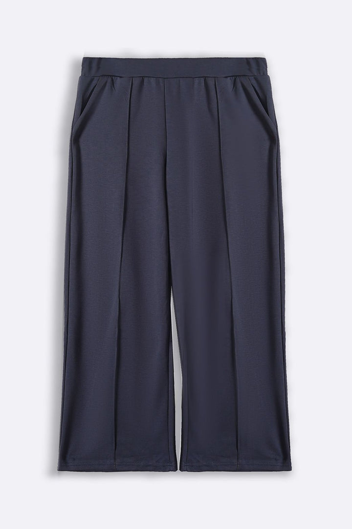 BLUE CURVE PLEATED TROUSERS