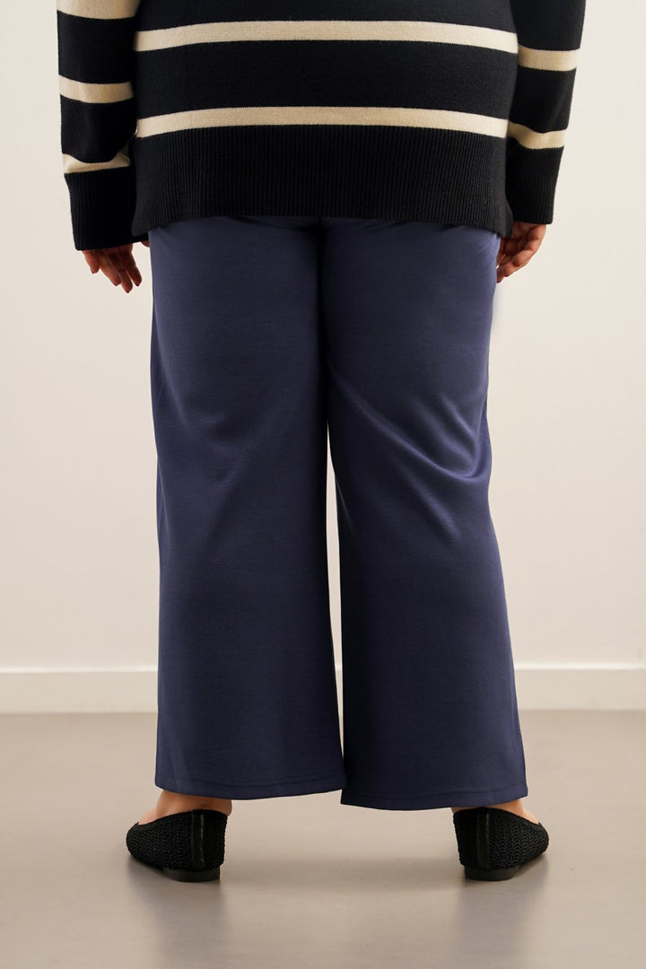 BLUE CURVE PLEATED TROUSERS