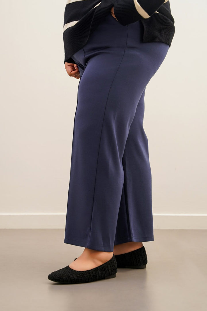 BLUE CURVE PLEATED TROUSERS