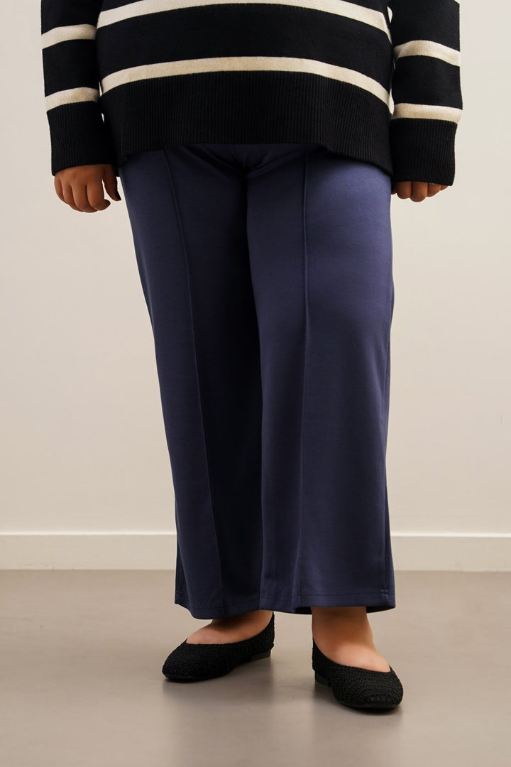 BLUE CURVE PLEATED TROUSERS