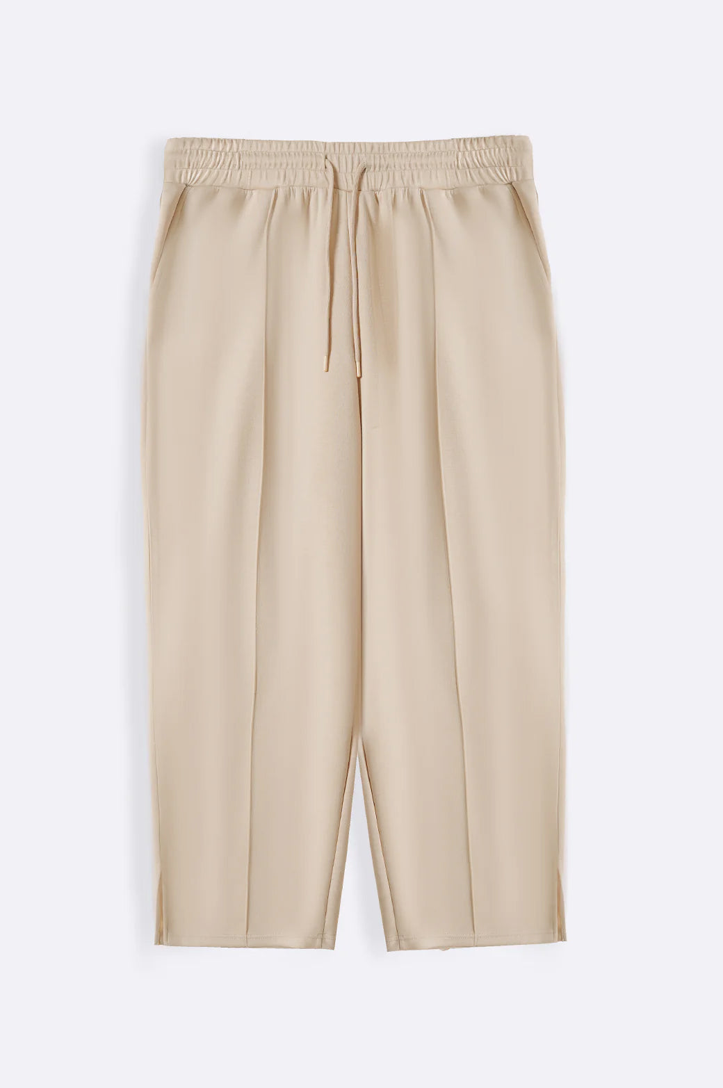 BEIGE CURVE PLEATED NEOPRENE TROUSERS