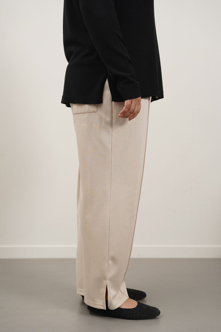 PLEATED NEOPRENE TROUSERS