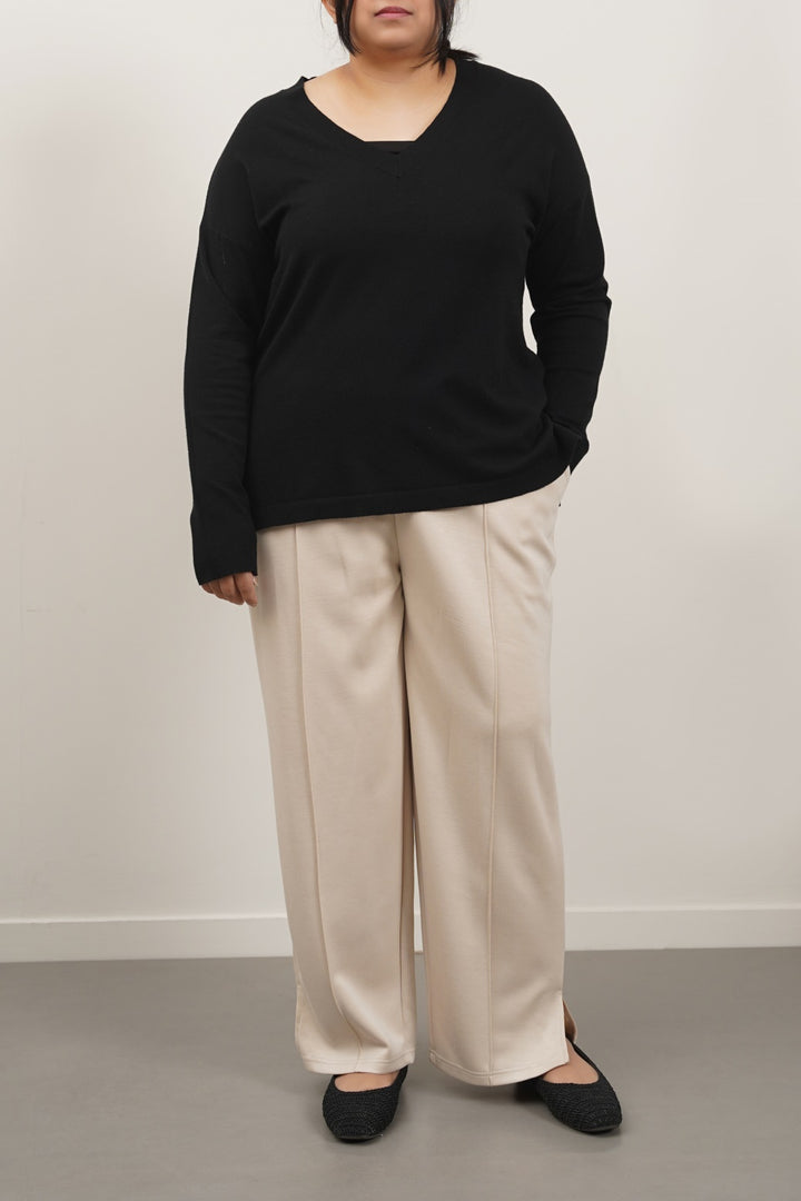 BEIGE CURVE PLEATED NEOPRENE TROUSERS