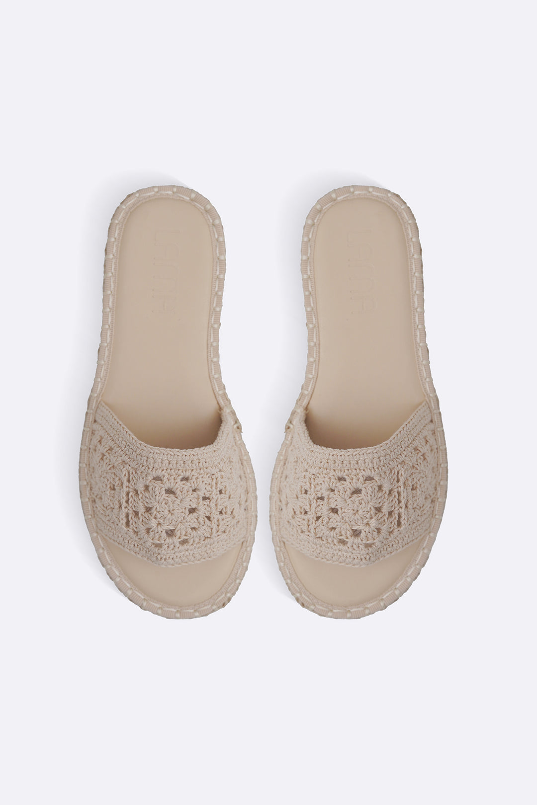 CREAM ROMA WOVEN SLIDES