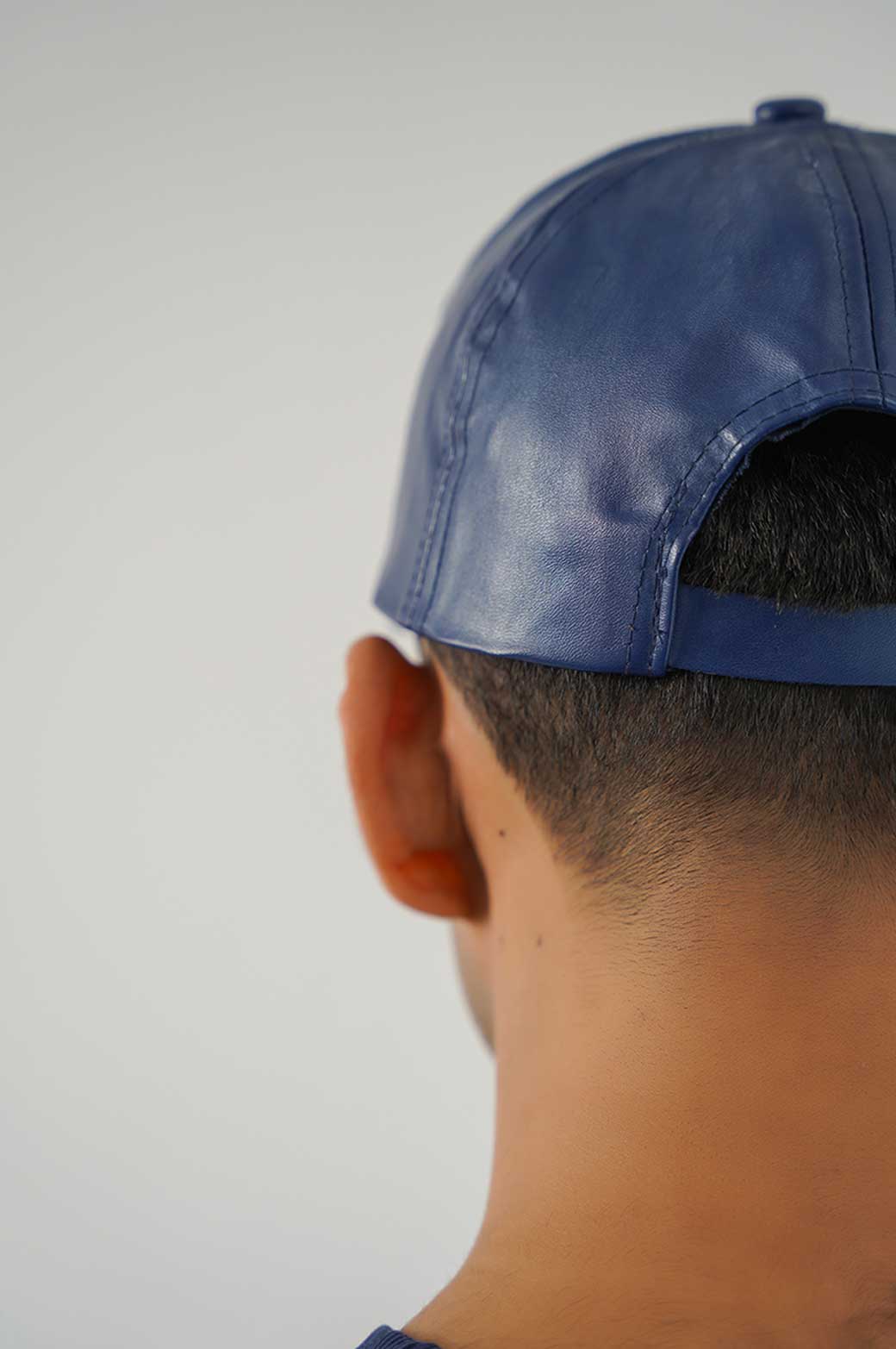 NAVY FAUX LEATHER CAP 