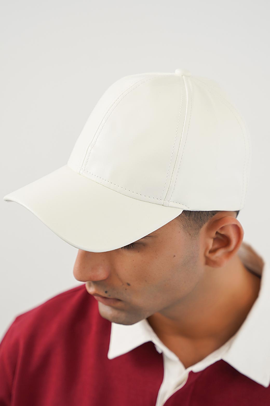 WHITE  FAUX LEATHER CAP 