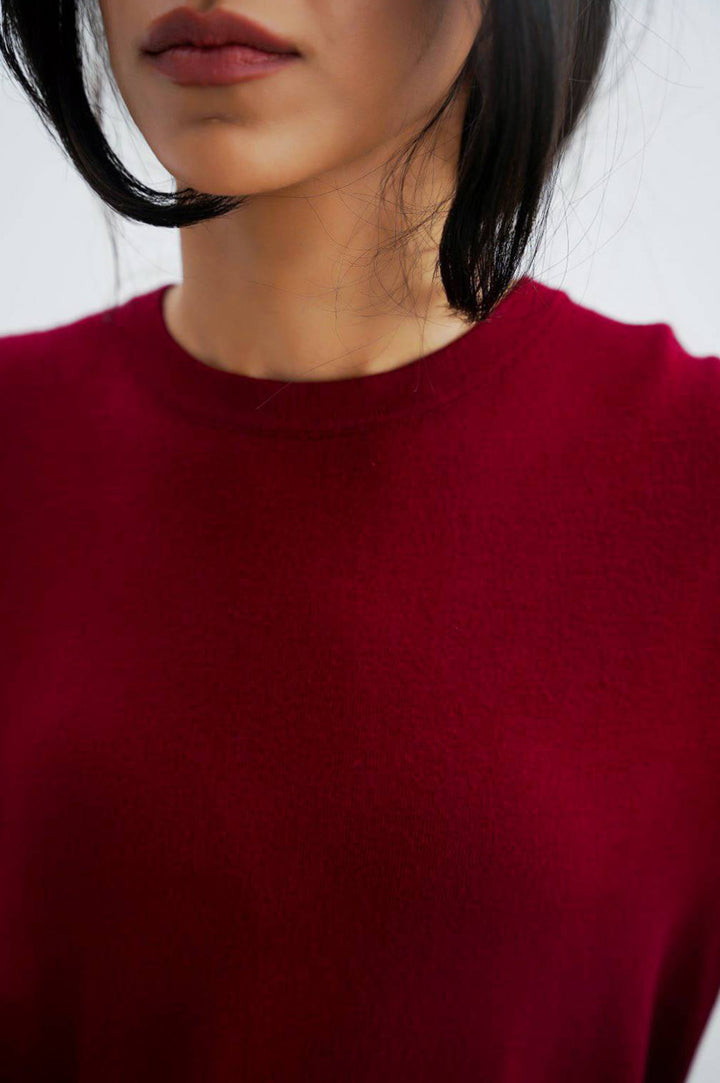 RED JUMPER WITH SLEEVE BUTTONS