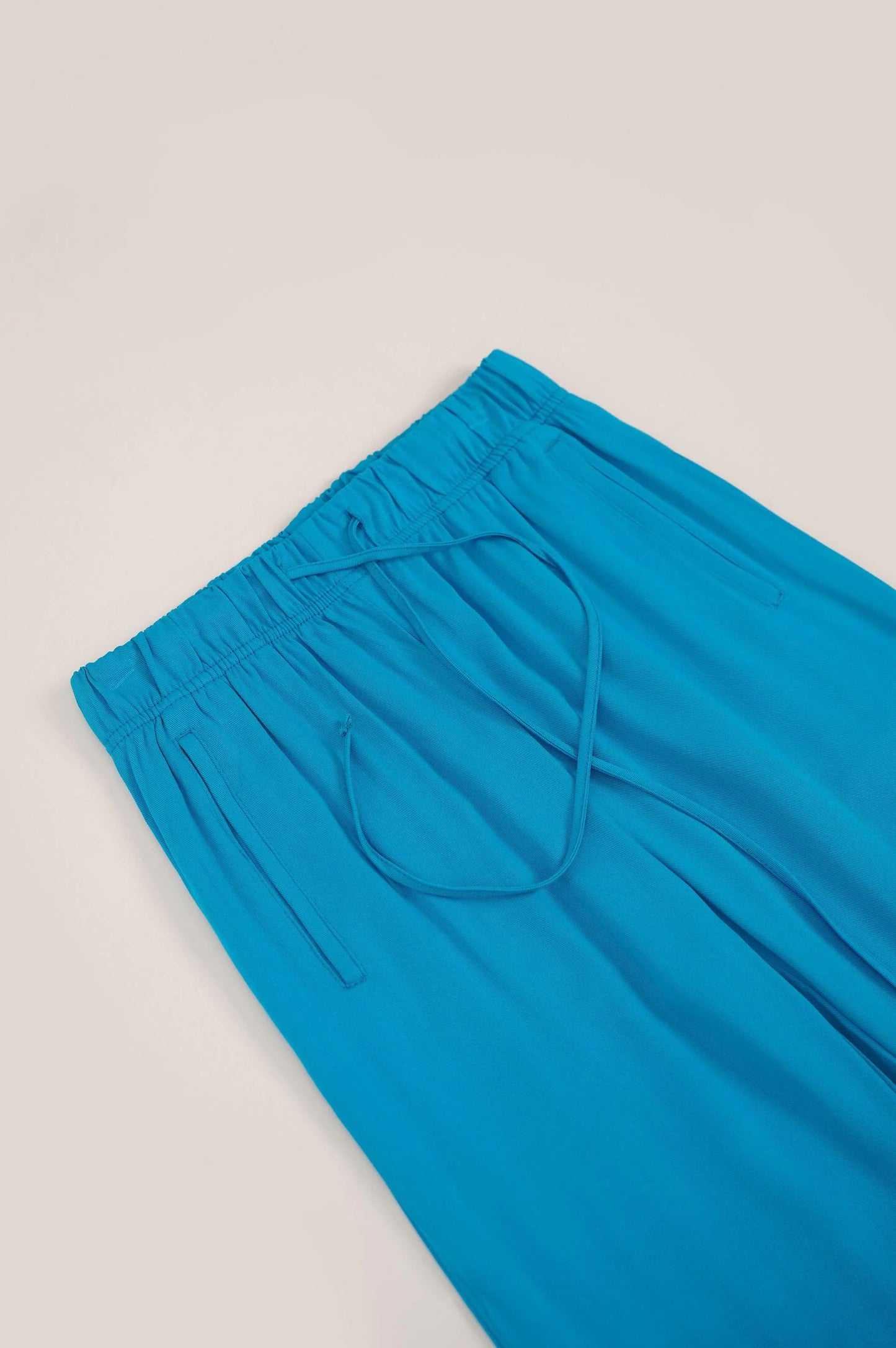 PANT WITH PEEKABOO BACK SLIT - PANTS
